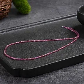 Stringed beads, garnet (pink), 02mm, faceted (39cm) | Marco Schreier