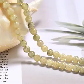 Filo di perle, granato (giallo) A, 06 mm | grossista gemme e pietre curative