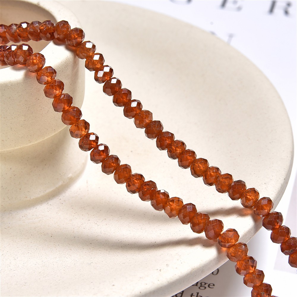 Rang de colliers, hessonite (grenat), facetté, 03 x 04mm (39cm) | Marco Schreier