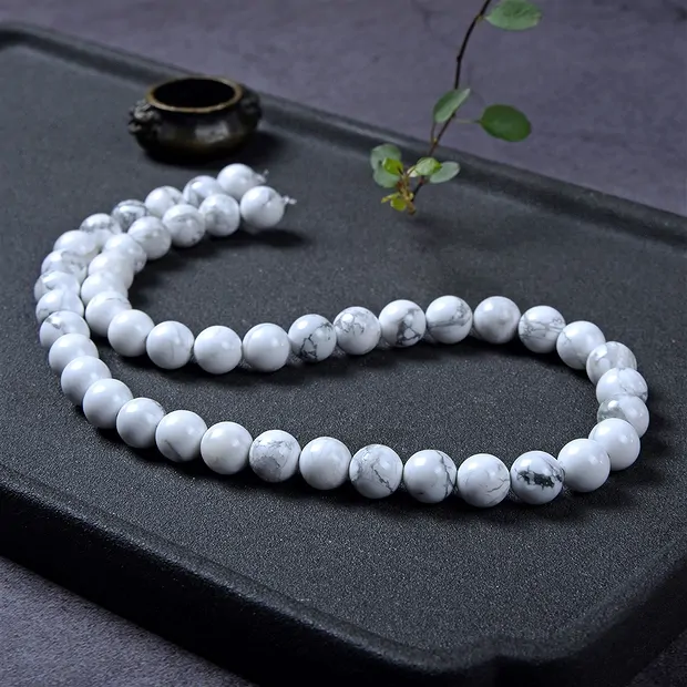 Rang de collier boules, Magnésite, 10mm (38cm) | Marco Schreier