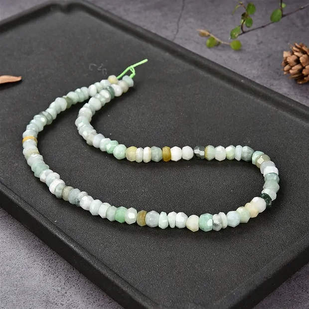 Strand Button Freeform, Jadeite, faceted, 03-06 x 07-08mm | Marco Schreier