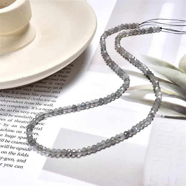 Strang Button, Labradorit (dunkel), facettiert, 03 x 04mm | Marco Schreier