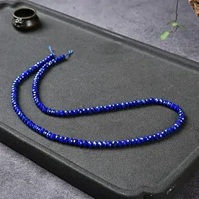 Collar de botones, Lapislázuli A+, facetado, 02 x 04mm | Marco Schreier