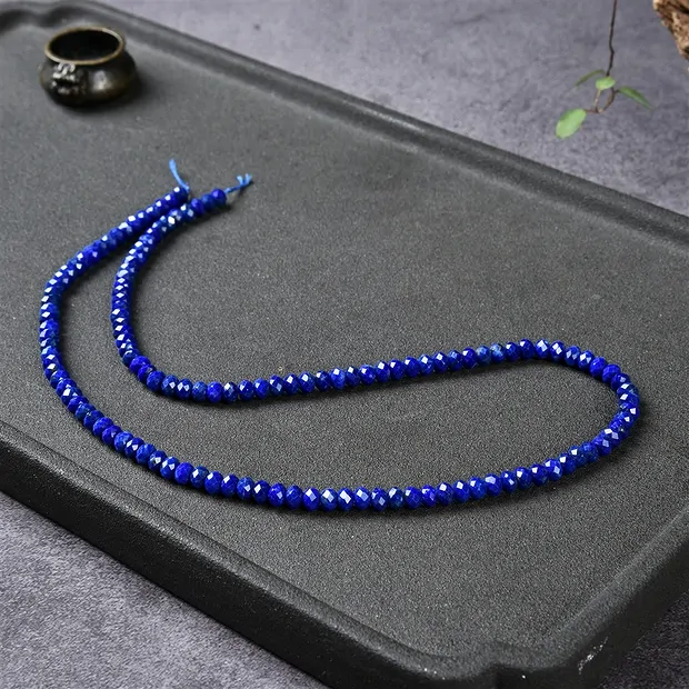 Rang de collier Boutons, Lapis-lazuli A+, facetté, 02 x 04mm | Marco Schreier