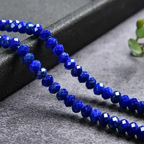 Collar de botones, Lapislázuli A+, facetado, 02 x 04mm | Marco Schreier