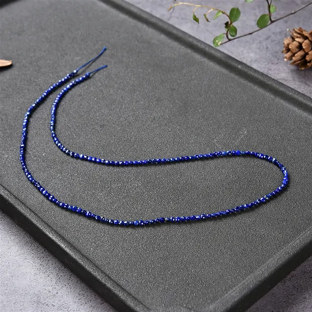 Rang de collier disque/pièce, Lapis-lazuli, facetté, 01,5 x 02,5mm | Marco Schreier