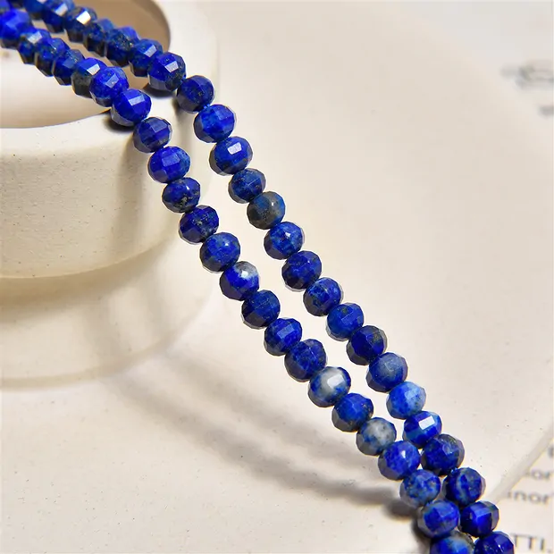 Filo di bottoni, Lapislazzuli, 04 x 03 mm, sfaccettato | Marco Schreier