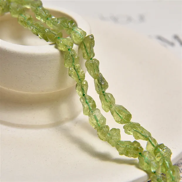 Filo di pepite, Peridoto, 07-09 x 08-10 mm (39 cm) | Marco Schreier