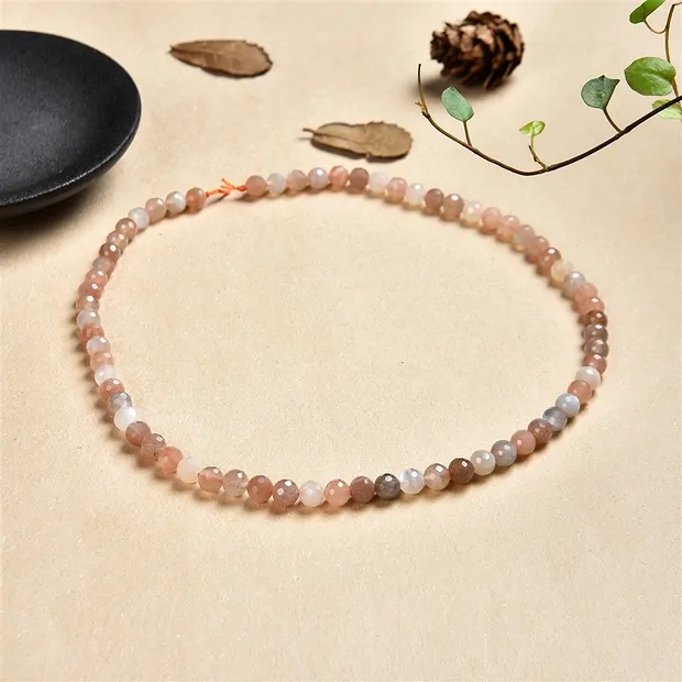 Rang de colliers boules, pierre de lune (multicolore), à facettes, 06mm | Marco Schreier