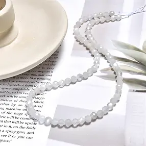 String Beads, Moonstone (white), faceted, 05mm (39cm) | Marco Schreier