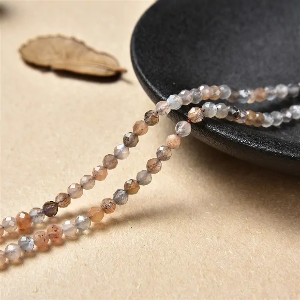 String Beads, Moonstone (multicolored), faceted, 03-04mm | Marco Schreier