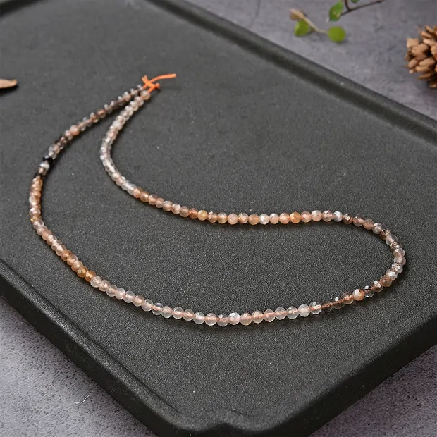 String Beads, Moonstone (brown/colored), faceted, 03mm | Marco Schreier