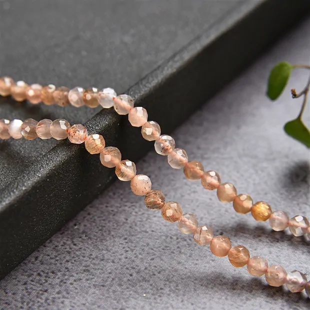 String Beads, Moonstone (brown/colored), faceted, 03mm | Marco Schreier