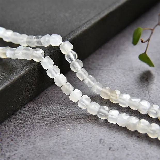 Strand cube, Moonstone (white), faceted, 04mm | wholesaler gems & healing stones