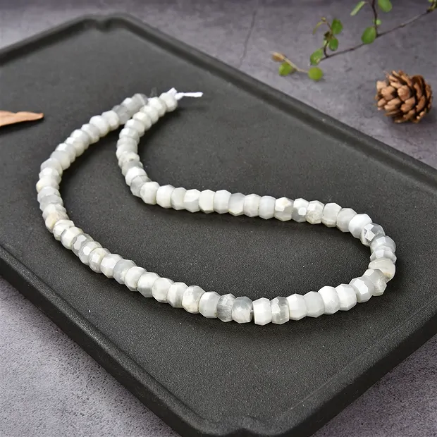 Button strand, Moonstone, faceted, 05-06 x 08-09mm | Marco Schreier