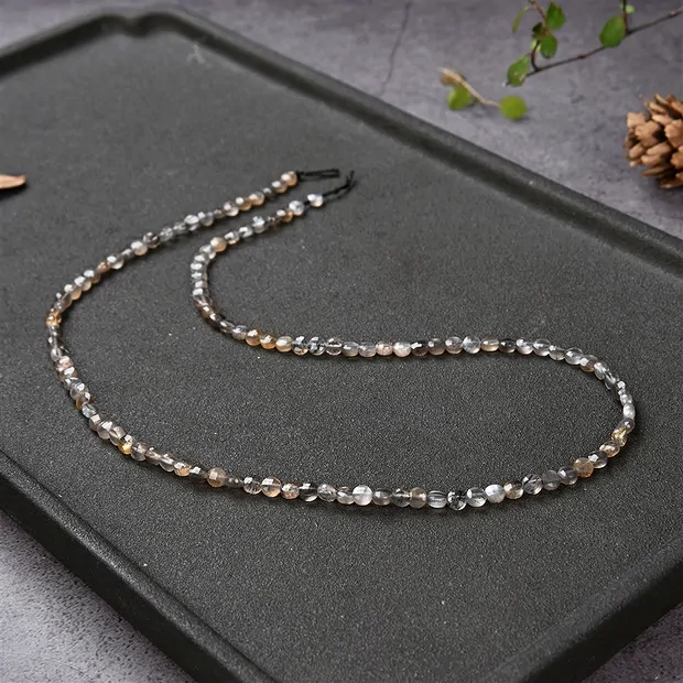 Rang de collier disque/pièce, pierre de lune (foncée), facetté, 04mm | Marco Schreier