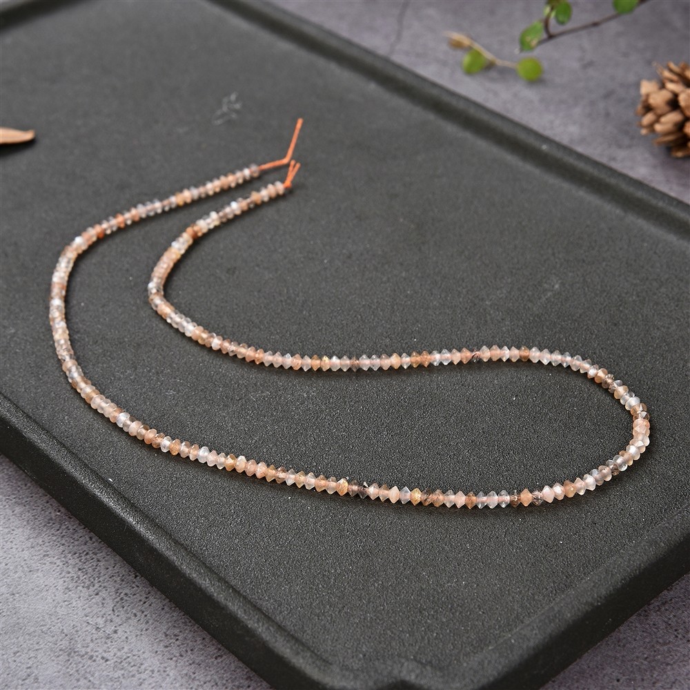 Button/disc strand, Moonstone, faceted, 02 x 03mm | Marco Schreier