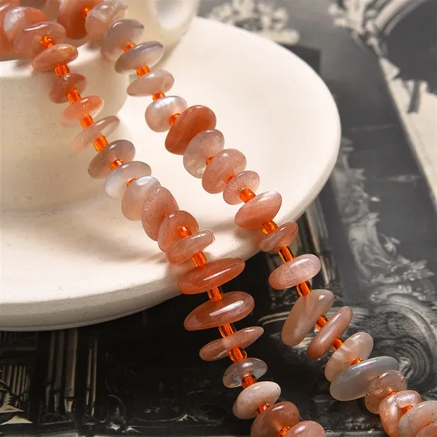 Strand of nuggets flat, Moonstone (orange), 2.5-4.0 x 8 -12mm (38cm) | Marco Schreier