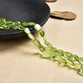 Strand Pebbles, Peridote A, 07 x 04mm | wholesale gems, healing stones & jewelry