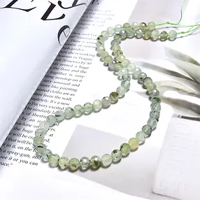 Strang Kugeln, Prehnit , facettiert, 06mm, 64cut | Marco Schreier