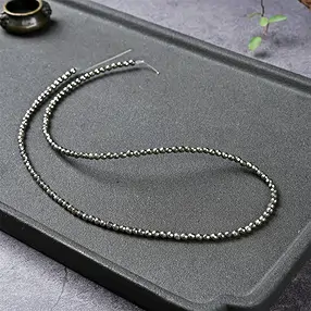 Strang Kugeln, Pyrit, facettiert, 03mm | Edelsteine, Heilsteine & Schmuck-Handel