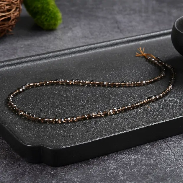 Strand Coin, Smoky Quartz, faceted, 04 x 02mm (39cm) | Marco Schreier