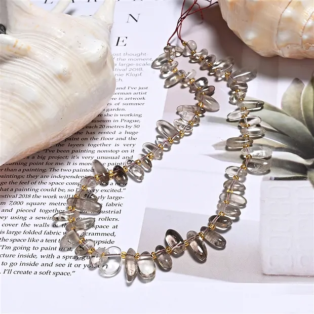 Strand of nuggets "Tooth", Smoky Quartz, 06-08 x 13-16mm | Marco Schreier