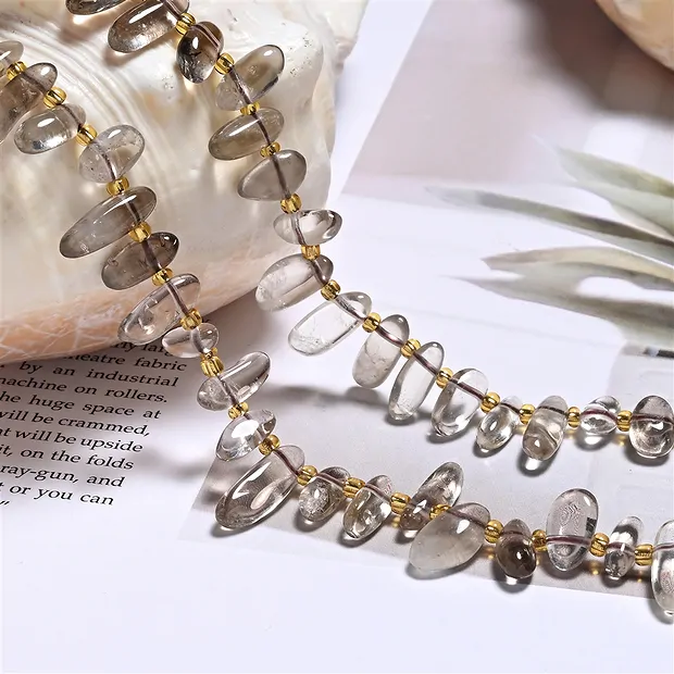 Strand of nuggets "Tooth", Smoky Quartz, 06-08 x 13-16mm | Marco Schreier