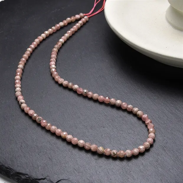 Rang de colliers boules, rhodochrosite, 04mm, à facettes | Marco Schreier