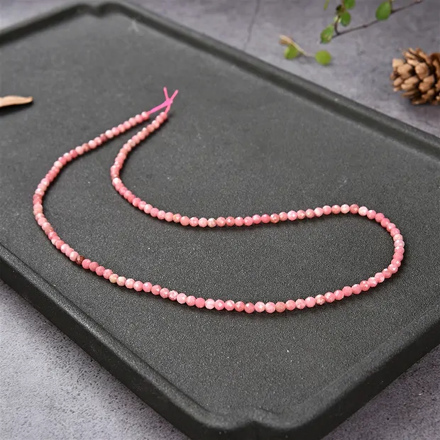 Strang Kugeln, Rhodonit, facettiert, 03mm (39cm) | Marco Schreier