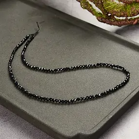 Rang de collier boules, Schorl (stab.), à facettes, 04mm | Marco Schreier