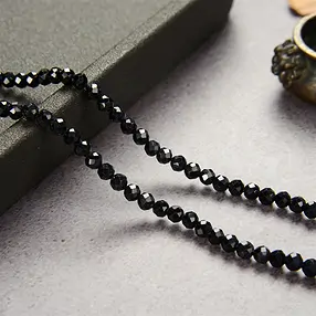 Rang de collier boules, Schorl (stab.), à facettes, 04mm | Marco Schreier