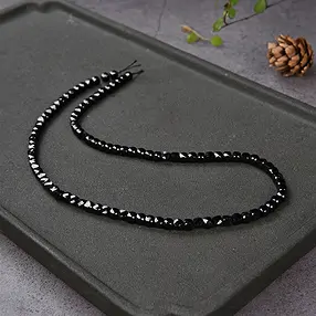 Stringed beads, Tourmaline (black), 04mm, faceted | Marco Schreier