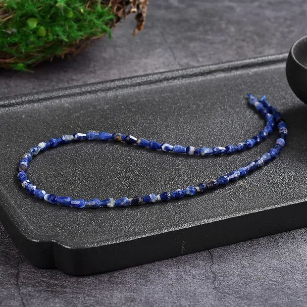 Drop strand, Sodalite, faceted, 04 x 06mm; (39cm) | Marco Schreier