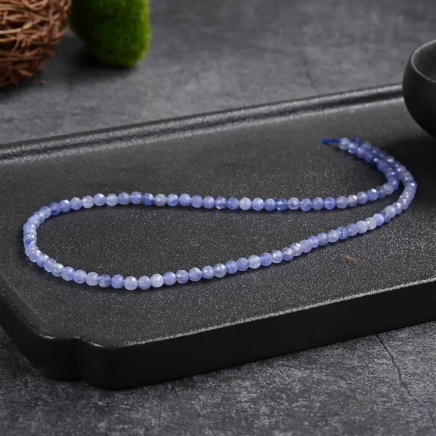 Rang de collier boules, tanzanite AA, facettes, 04mm (39cm) | Marco Schreier