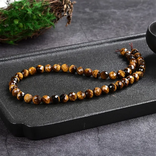 String Beads, Tiger's Eye (Gold), 07-08mm, faceted (39cm) | Marco Schreier