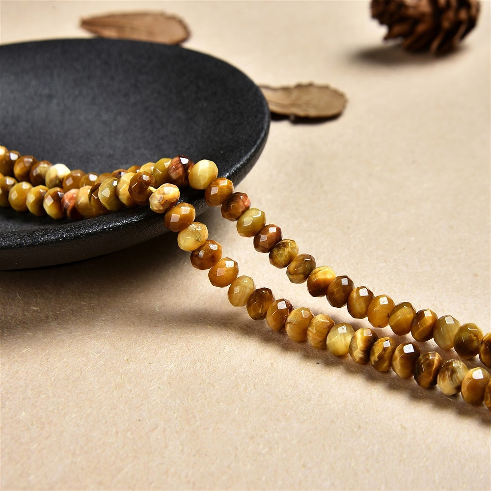 Collar de botones, Ojo de tigre (amarillo), facetado, 05 x 08mm (38cm) | Marco Schreier