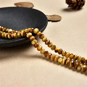 Filo di bottoni, Occhio di tigre (giallo), sfaccettato, 03 x 08 mm | Marco Schreier