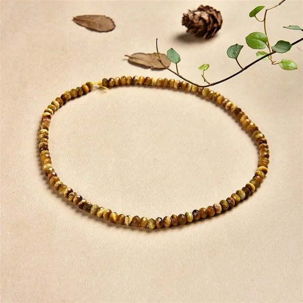 Strang Button, Tigerauge (gelb), facettiert, 03 x 08mm | Marco Schreier