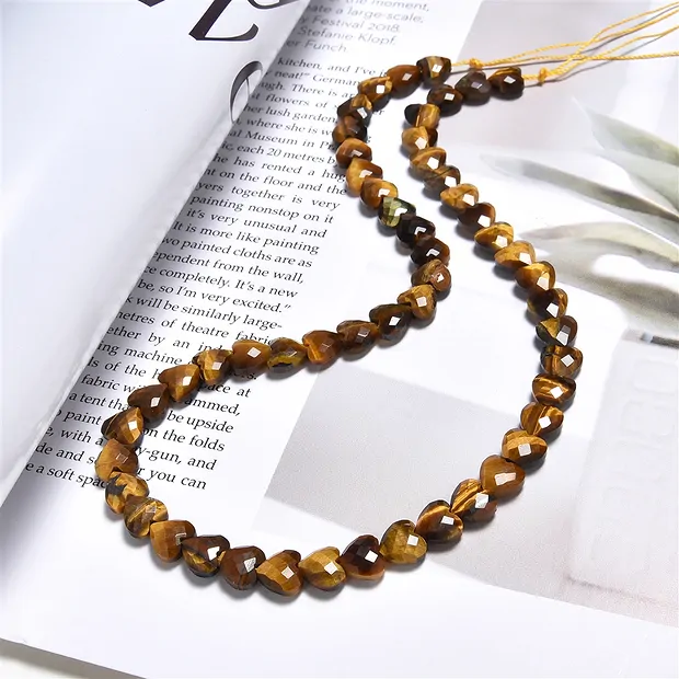 Strang Herz, Tigerauge, 08mm, facettiert | GH Edelsteine, Heilsteine & Schmuck