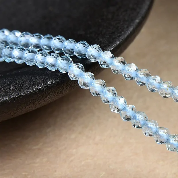 String Beads, Topaz (blue), 02.5mm, faceted | wholesaler gems & healing stones