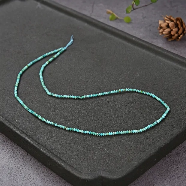 Strang Button/Disc, Türkis (stab.), facettiert, 01 x 02mm | Marco Schreier