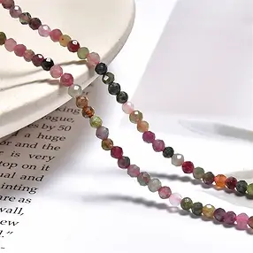 Strang Kugeln, Turmalin (rosa/bunt), facettiert, 03mm (39cm) | Marco Schreier