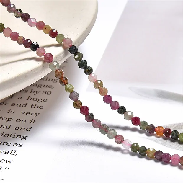 String Beads, Tourmaline (multicolour), faceted, 03mm (39cm) | Marco Schreier