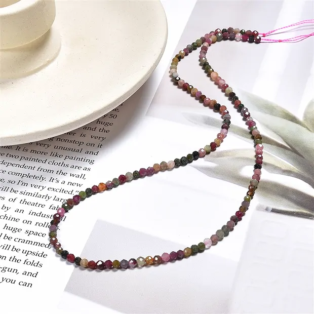 String Beads, Tourmaline (multicolour), faceted, 03mm (39cm) | Marco Schreier