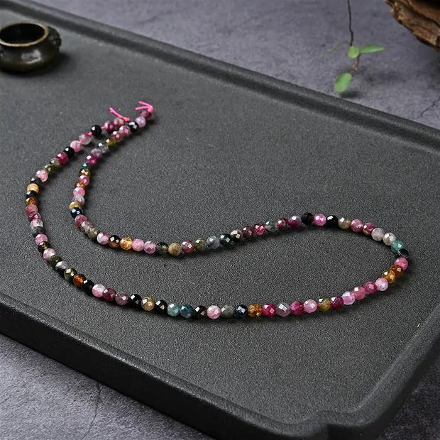 String Beads, Tourmaline (multicolour), faceted, 04,5mm | Marco Schreier