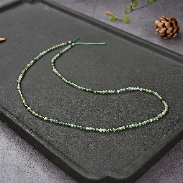 Strang Kugeln, Turmalin (olivgrün), facettiert, 03mm (39cm) | Marco Schreier