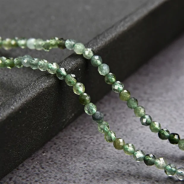 Rang de collier boules, tourmaline (vert olive), à facettes, 03mm (39cm) | Marco Schreier