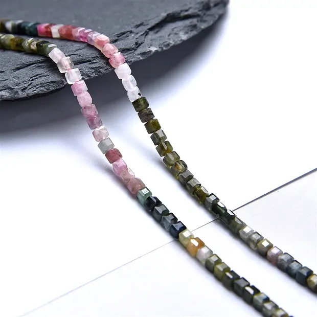 Stringed beads, Tourmaline (multicolour), 03mm, faceted (39cm) | Marco Schreier