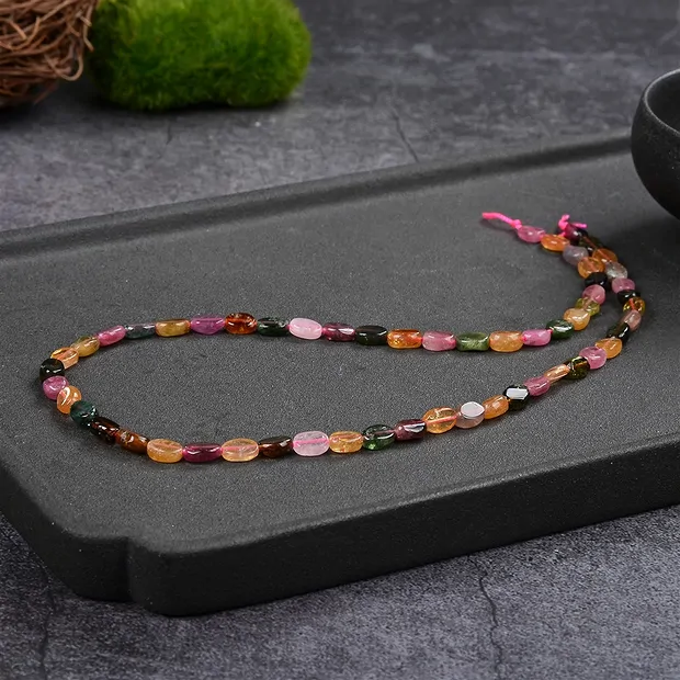 Strang Linse, Turmalin (bunt), 07 x 05mm | GH Edelsteine, Heilsteine & Schmuck